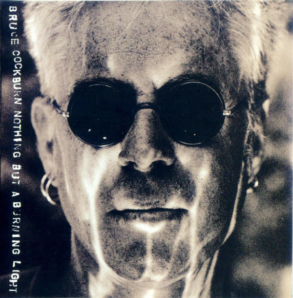 Bruce Cockburn – Nothing But A Burning Light (CD Album)